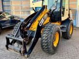 2011 JCB 409 wheel loader, front three-quarter view