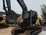 2025 Volvo EC140 crawler excavator, front three-quarter view
