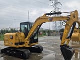 2022 Caterpillar 305.5E2 mini excavator, side view