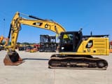 2018 Caterpillar 320 crawler excavator, side view