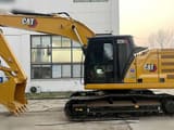 2022 Caterpillar 320GC crawler excavator, side profile view