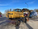 1991 Zeppelin ZM 15 wheel excavator, rear three-quarter view