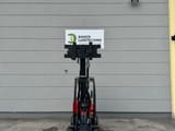 2023 Oehler A6026 mini excavator, front view with forks