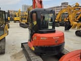 2022 Kubota KX155 mini excavator, rear three-quarter view