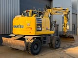 2017 Komatsu PW148-10 wheel excavator, rear three-quarter view