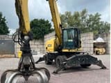 2015 Caterpillar 302.2 material handler, front three-quarter view