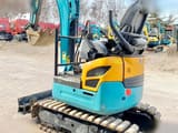 2021 Kubota U17 mini excavator, rear three-quarter view