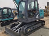 2023 Kobelco SK75 mini excavator, front three-quarter view