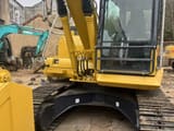 2019 Komatsu PC130 crawler excavator, front three-quarter view