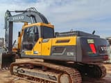 Volvo EC290 crawler excavator, rear three-quarter view