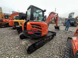 2023 Kubota KX163 mini excavator, rear three-quarter view