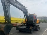2023 Hyundai R210W wheel excavator, front three-quarter view