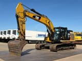 2019 Caterpillar 326FL crawler excavator, side profile view