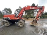 1995 O&K MH 4PLUS wheel excavator, side profile view