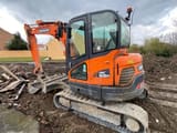 2018 Doosan DX62R-3 mini excavator, rear three-quarter view