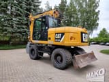 2016 Caterpillar M313D wheel excavator, rear three-quarter view