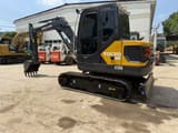 2022 Volvo EC55D mini excavator, rear three-quarter view