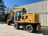 2016 Caterpillar M318F wheel excavator, side profile view