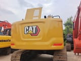 2025 Caterpillar 323 crawler excavator rear view