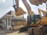 2016 Caterpillar 329D crawler excavator, front three-quarter view