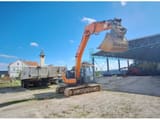 Doosan DX140LC-5 crawler excavator, side view
