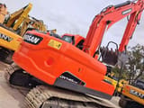 Doosan DX140LC-9C crawler excavator, rear three-quarter view