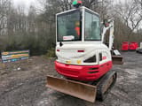2018 Takeuchi TB230 mini excavator, rear three-quarter view