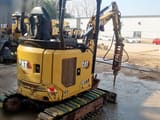 2020 Caterpillar 301.7CR mini excavator, rear three-quarter view