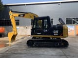2022 Caterpillar 312D crawler excavator, side view