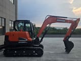 2024 Doosan DX60-9C mini excavator side view