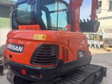 2016 Doosan DX60 crawler excavator, rear three-quarter view
