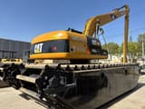 2016 Caterpillar 320CL amphibious excavator, rear three-quarter view