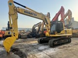 2024 Komatsu PC220 crawler excavator, side view