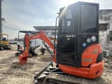 2022 Kubota U-20 mini excavator, rear three-quarter view