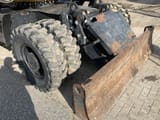 2008 Caterpillar M318D wheel excavator dozer blade view