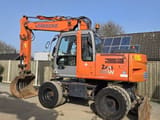 2006 Hitachi Zaxis 130W wheel excavator, side profile view