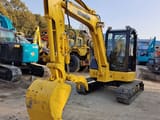2024 Komatsu PC55 crawler excavator, front three-quarter view