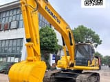 2024 Komatsu PC210 crawler excavator, front three-quarter view
