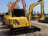Komatsu PC56 mini excavator, side view
