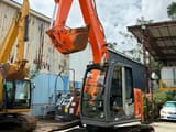 2025 Hitachi 135 crawler excavator, front three-quarter view