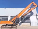 2012 Doosan DX420LC demolition excavator, side profile view
