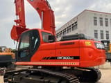 2023 Doosan DX300LC crawler excavator, rear three-quarter view