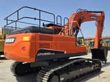 2023 Doosan DX300LC-9C excavator, rear three-quarter view