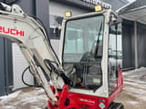 2017 Takeuchi TB230 mini excavator cab and boom view