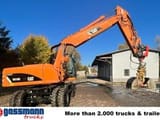 2011 Caterpillar M318D wheel excavator, rear three-quarter view