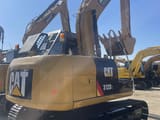 2024 Caterpillar 312D2 crawler excavator rear three-quarter view