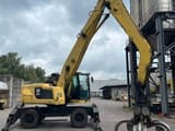 2015 Caterpillar 302.2 material handler, side view