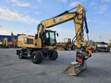 2016 Caterpillar M318F wheel excavator, side view