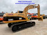 2023 Caterpillar 320CL crawler excavator, rear three-quarter view