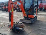 2024 Kubota KX019-4 mini excavator, front three-quarter view